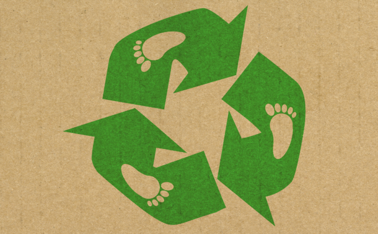 recycling icon made up of 3 green arrows in circular design with footprint in each arrow
